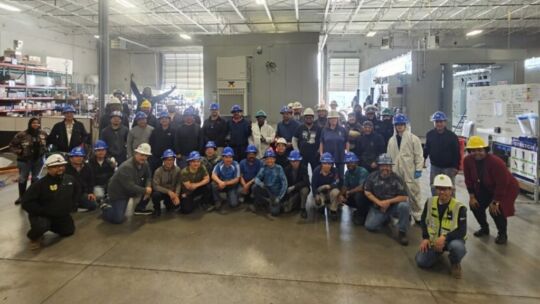 The Crown Texas team celebrates another control building shipped