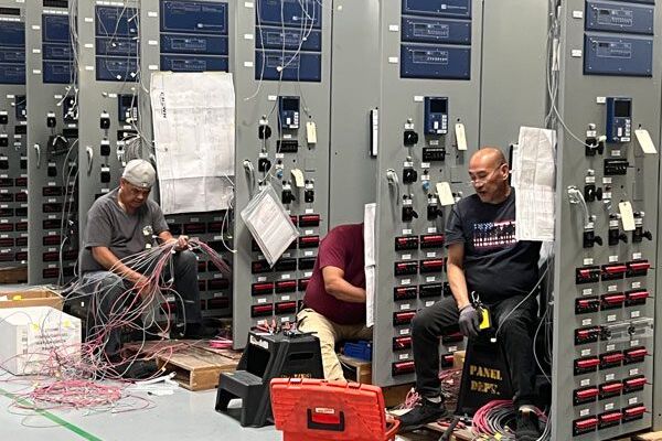 Highly skilled wiremen on Crown’s Control Panel Shop floor